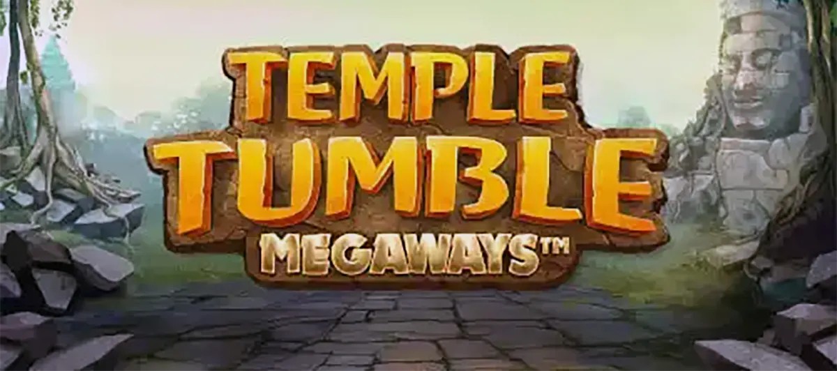 “Temple Tumble Megaways title screen showing large 3D gold lettering on a stone plaque, set against a misty jungle temple path with ancient ruins and carved stone faces in the background.”